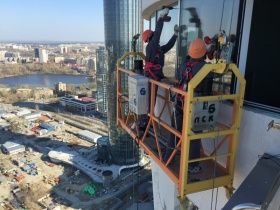 Как выбрать строительный подъемник люльку для фасадных работ?